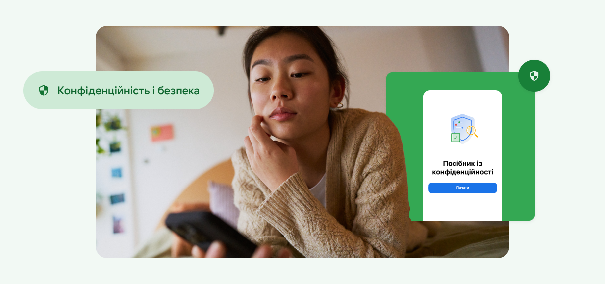 Жінка торкається обличчя й дивиться в телефон.