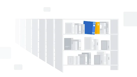 Kleurrijke boeken die afsteken tegen rijen grijze bibliotheekplanken